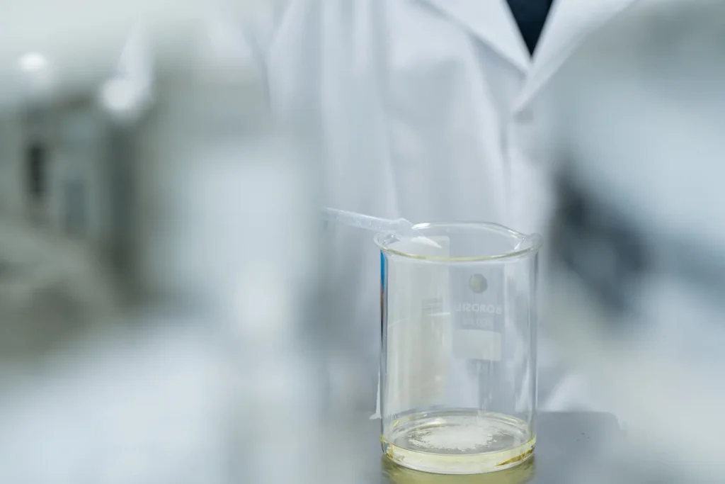 Scientist mixing solution in laboratory