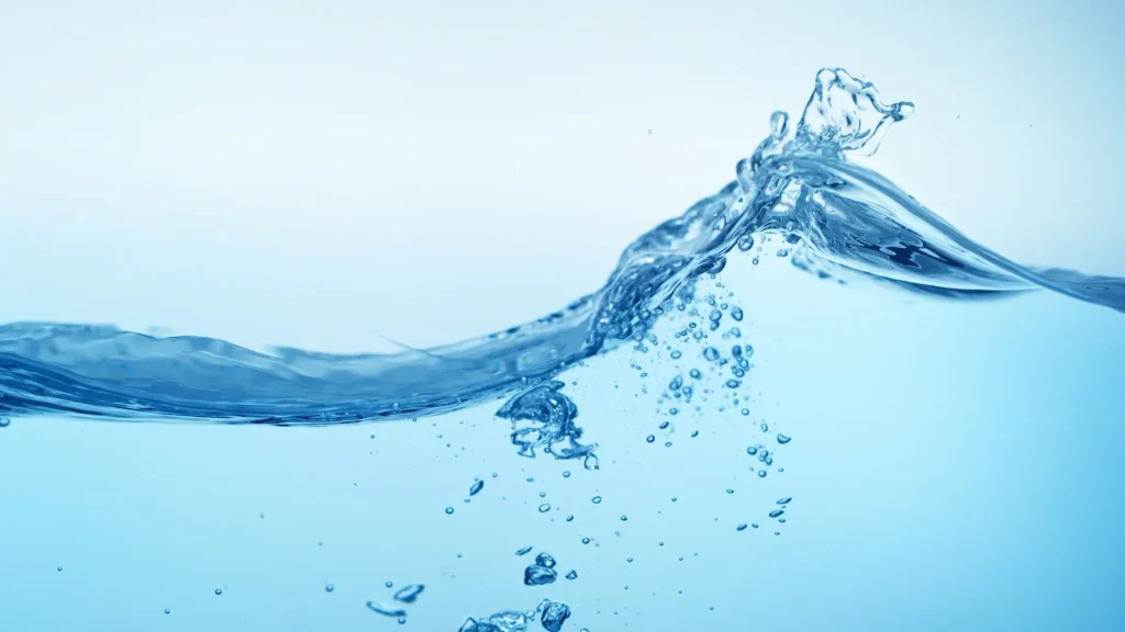 Clear water wave with bubbles