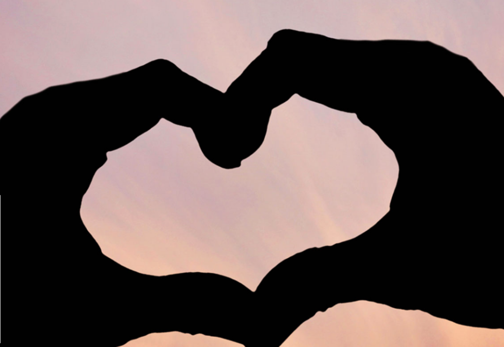 Hands forming a heart shape.