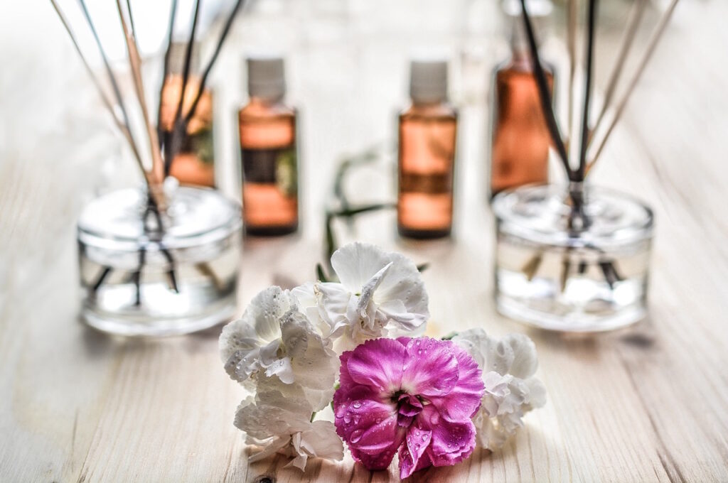 Aromatic oils and fresh flowers for aromatherapy